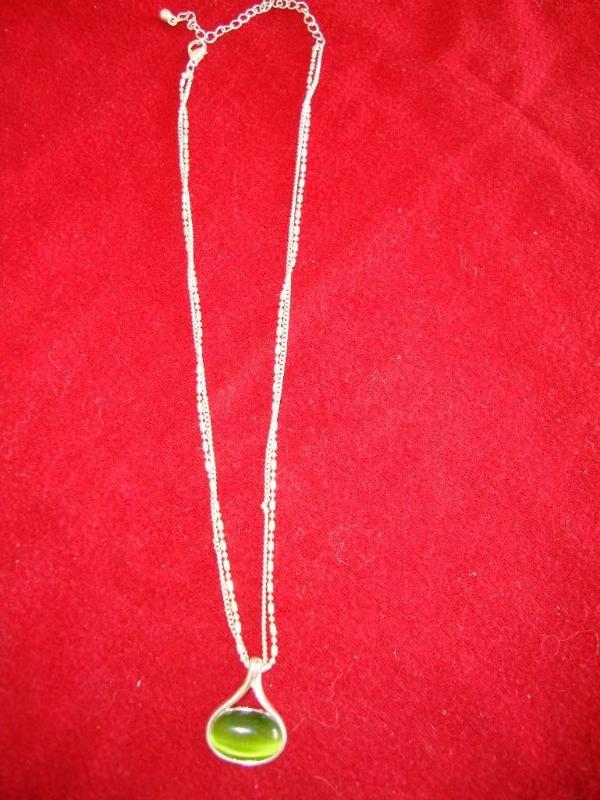 Silver color chain with green stone...