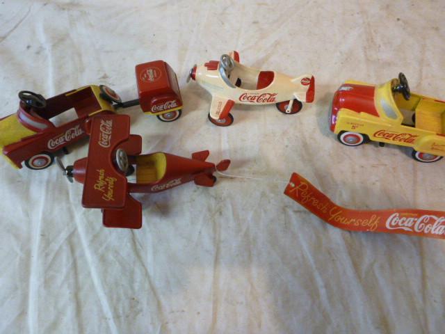 lot 102 image: 4 Coco-Cola Metal Collector Toys...