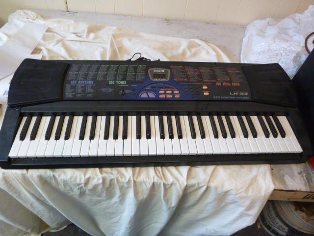 lot 174 image: Casio Electric Keyboard Model #LK-3...