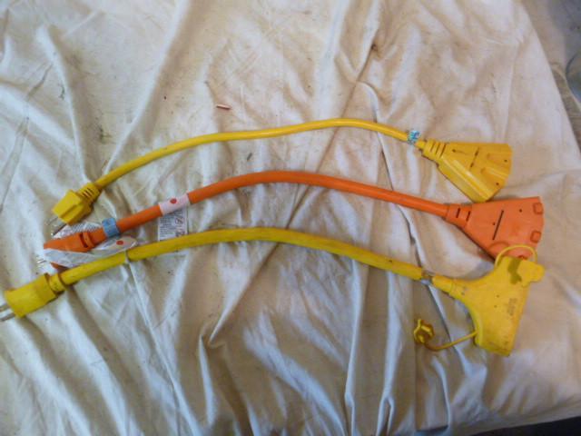 lot 199 image: 3 3-Way Outlet Cords...