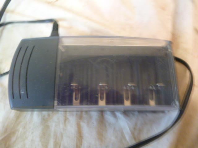 lot 233 image: Rayovac Battery Charger...