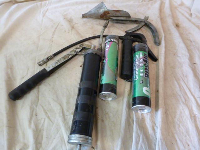 lot 370 image: 2 Grease Guns and 2 Tubes of Grease...