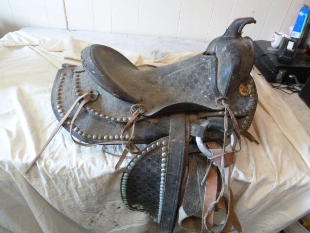 lot 374 image: Saddle Not in the best condition....