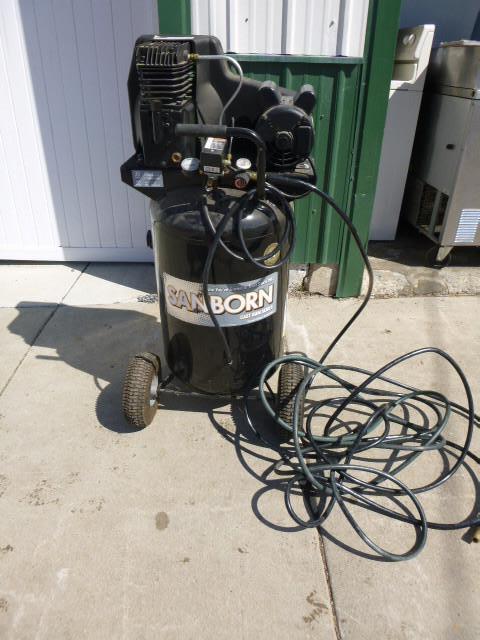 lot 7 image: Sanborn Air Compressor Cast Irons S...