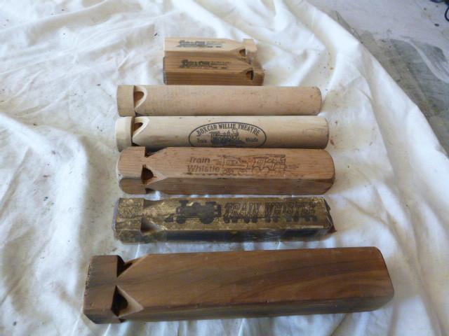 lot 87 image: 7 Wood Train Whistles...