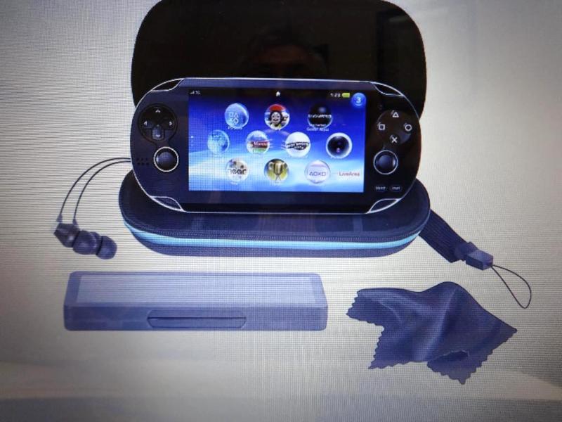 PS VITA 7 IN 1 STARTER KIT. Bidder ...