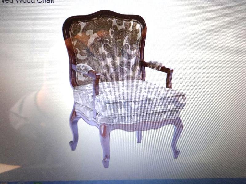 CARVED WOOD CHAIR. Bidder is respon...