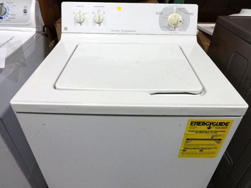 GE TOP LOAD WASHER IN WHITE. Bidder...