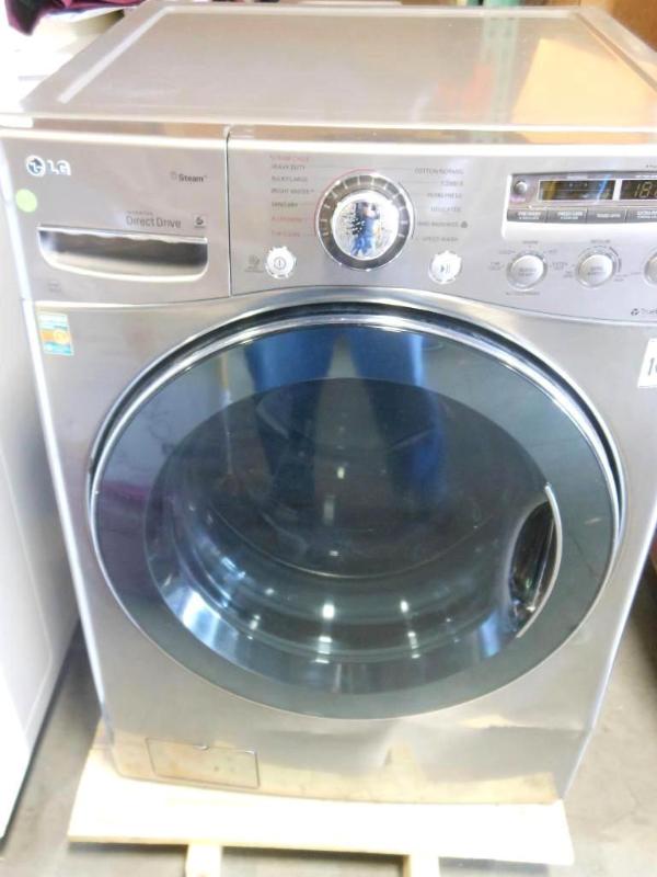 LG GRAPHITE STEAM WASHER. Bidder is...