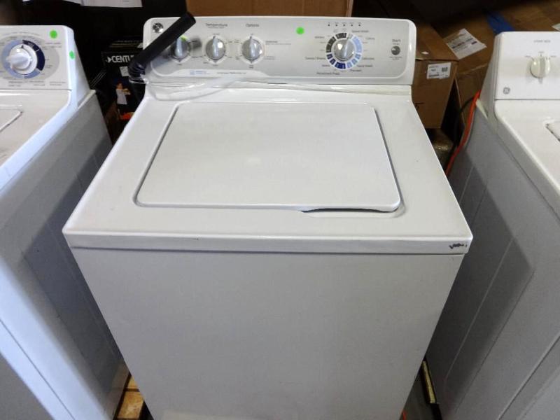 GE TOP LOAD WASHER IN WHITE. Bidder...