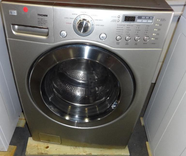 LG STAINLESS STEEL WASHER. Bidder i...