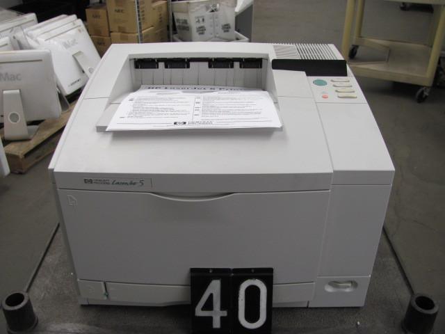 lot 40 image: HP laserjet 5 printer. This unit ha...