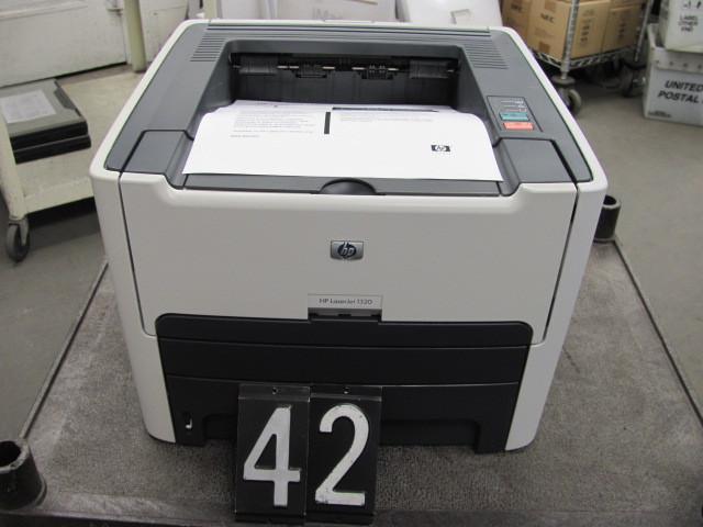 lot 42 image: HP laserjet 1320 printer. This unit...