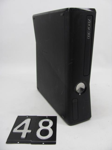 lot 48 image: Xbox 360 console. Tested and workin...