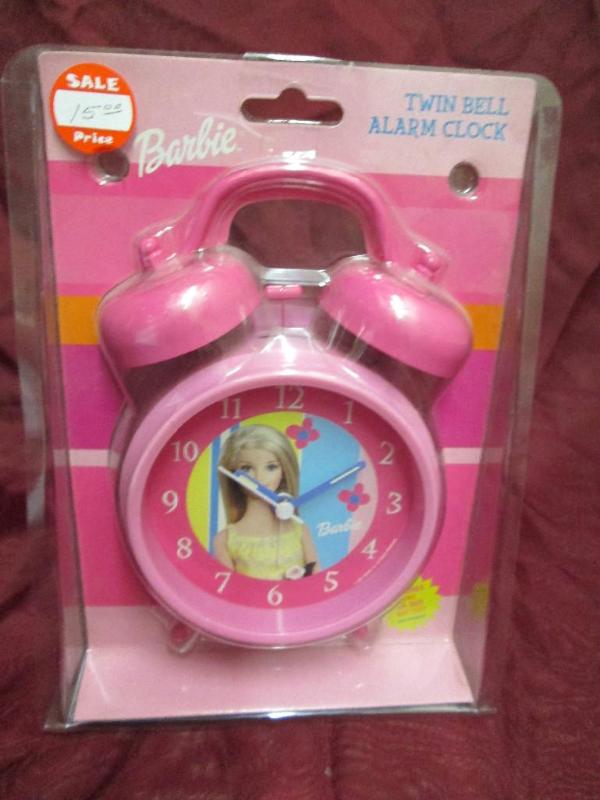 lot 113 image: Barbie twin bell alarm clock. New i...