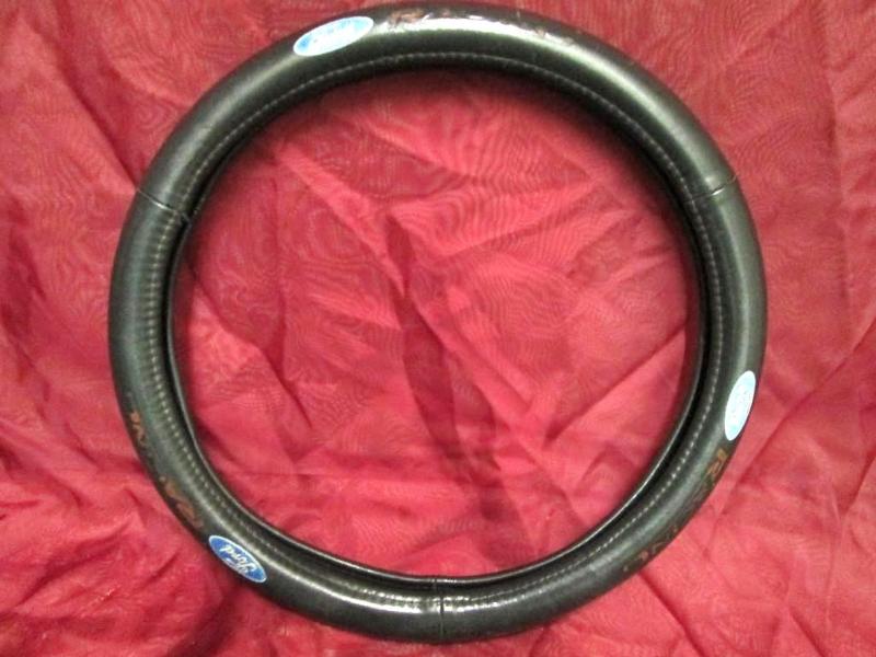 lot 117 image: Ford racing steering wheel cover....