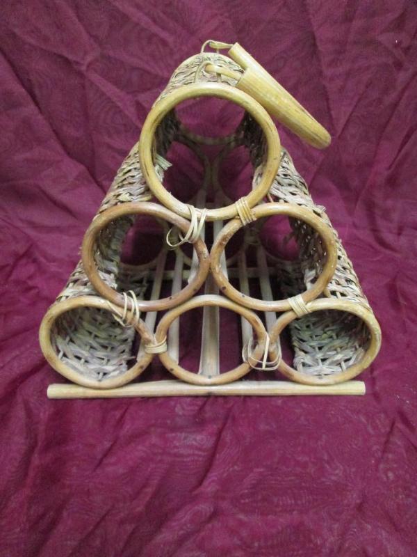 lot 132 image: Wicker wine rack....