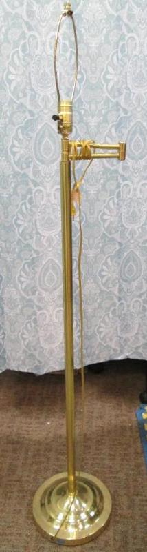 lot 136 image: 56 floor lamp, gold in color. No sh...