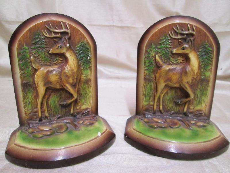 lot 140 image: Vintage porcelain book ends featuri...