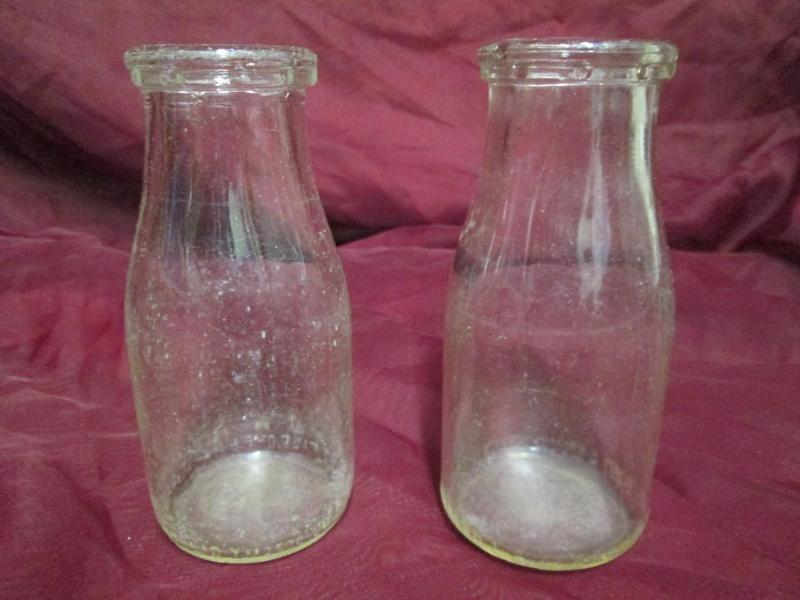 lot 147 image: pint glass milk bottles in mint con...