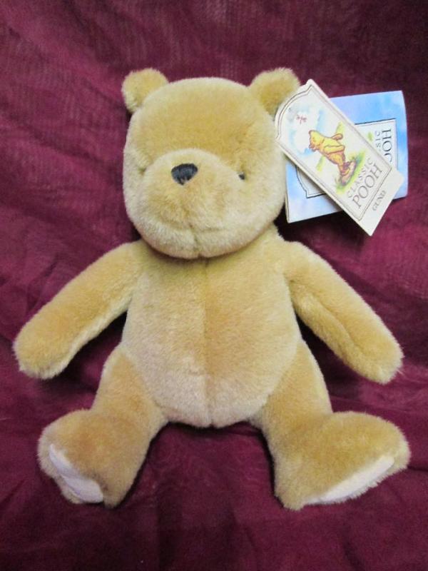 lot 173 image: Classic Winnie Pooh. New with tags....