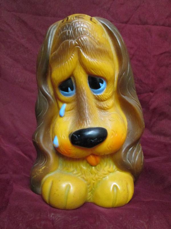 lot 182 image: Vintage sad dog coin bank....