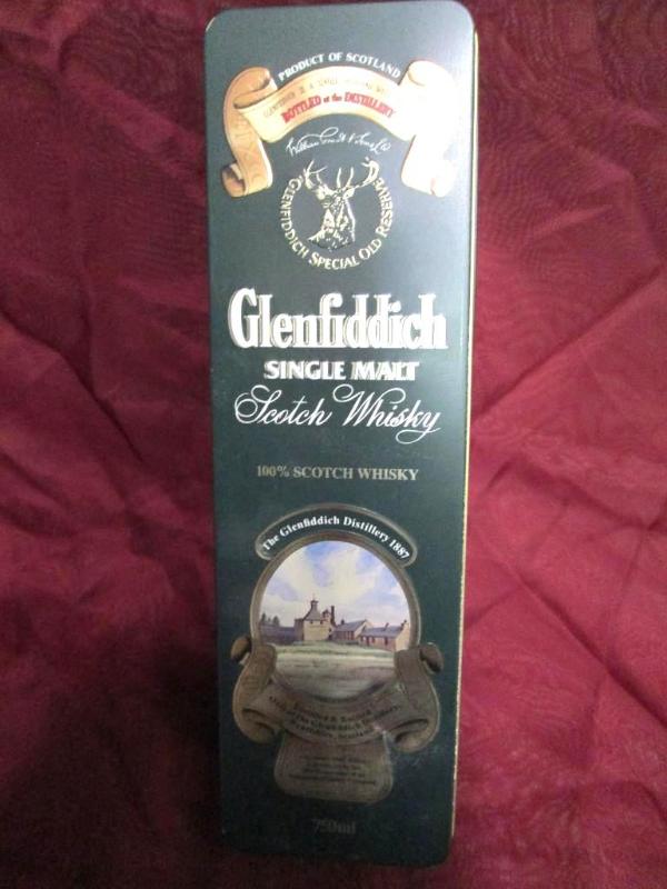 lot 20 image: Glenfiddich scotch whiskey tin with...