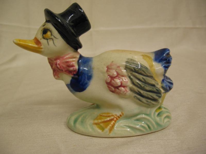 lot 212 image: Vintage duck salt shaker...