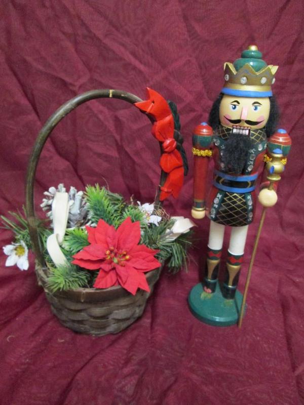 lot 25 image: Christmas decorations. Basket of po...