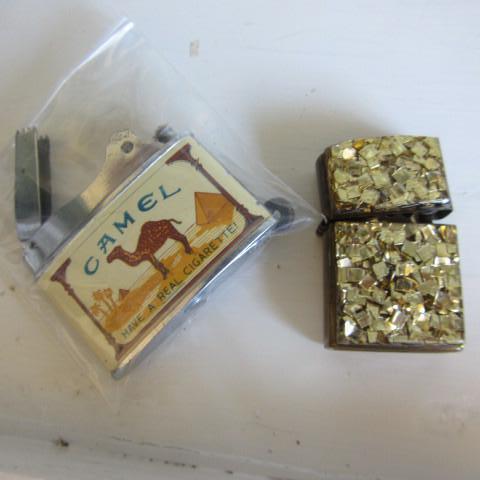 lot 152 image: Lighters, Camel and Bling