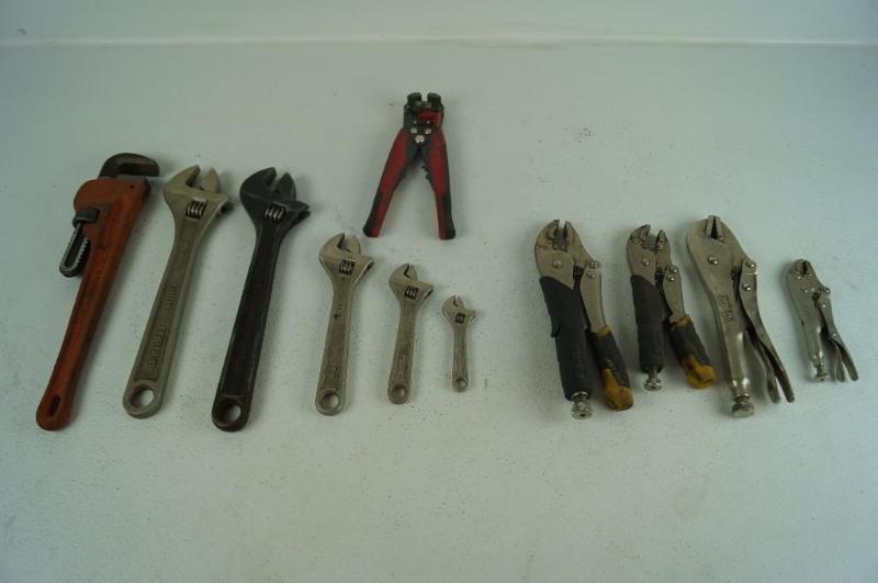 Assortment of adjustable wrenches and Vice Grips