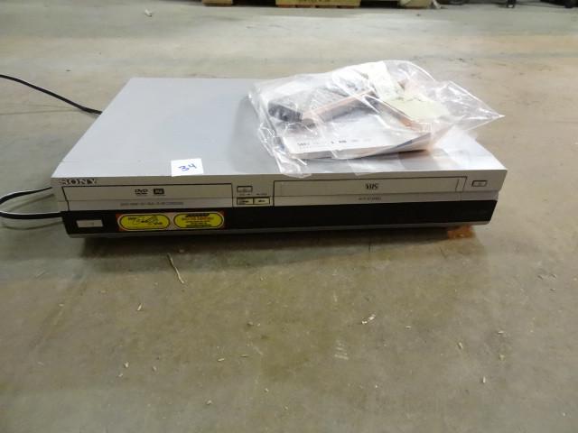 lot 34 image: Sony DVD VHS player. The eject butt...