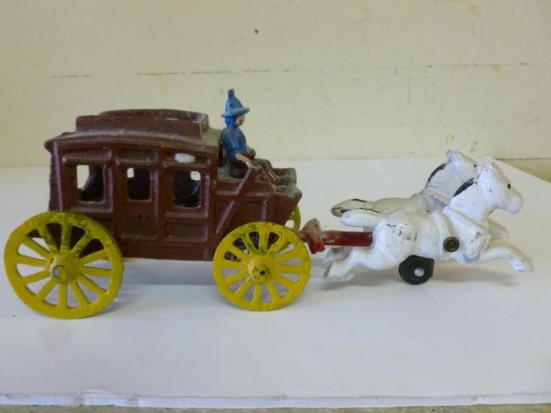 lot 182 image: Cast iron horse and wagon mantle de...