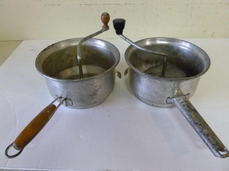 lot 192 image: Lot of two vintage food mills....