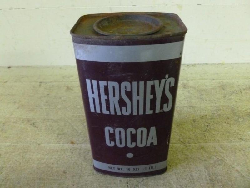 lot 32 image: Vintage Hersheys Cocoa metal produ...