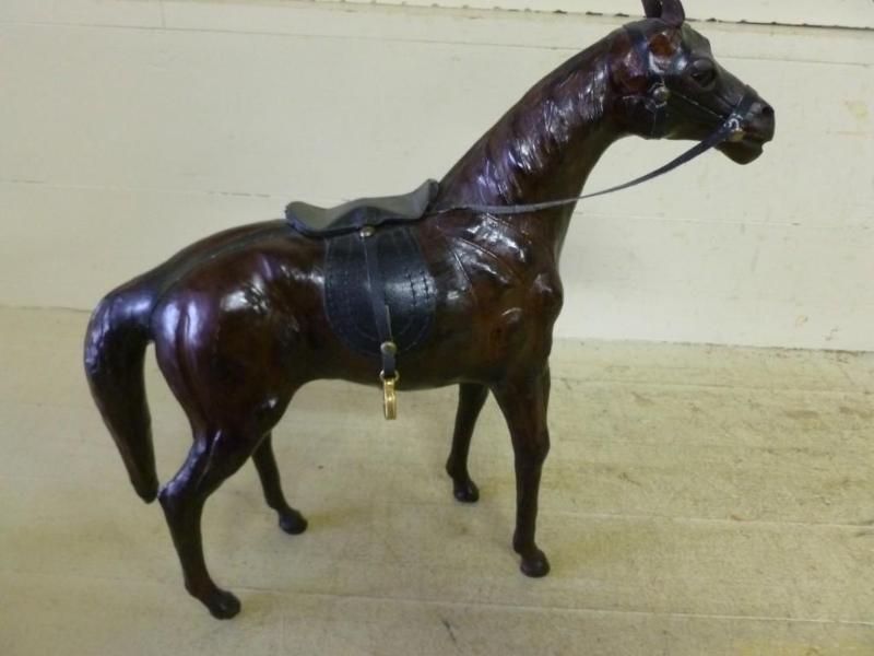 lot 40 image: Large leather horse that measures 1...