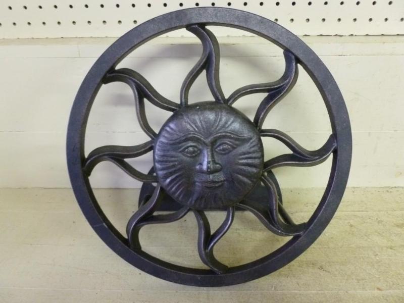 lot 41 image: Large sundial cast metal hose reel ...