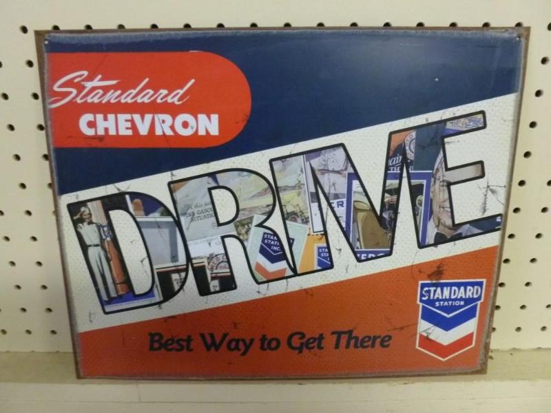 lot 50 image: Standard - Chevron metal sign that ...