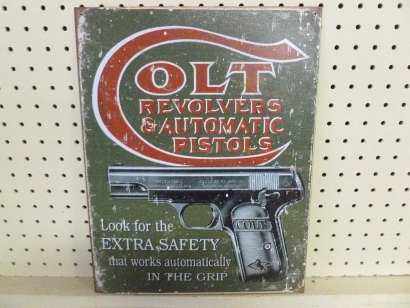 lot 52 image: Colt metal sign that measures 12.5&...