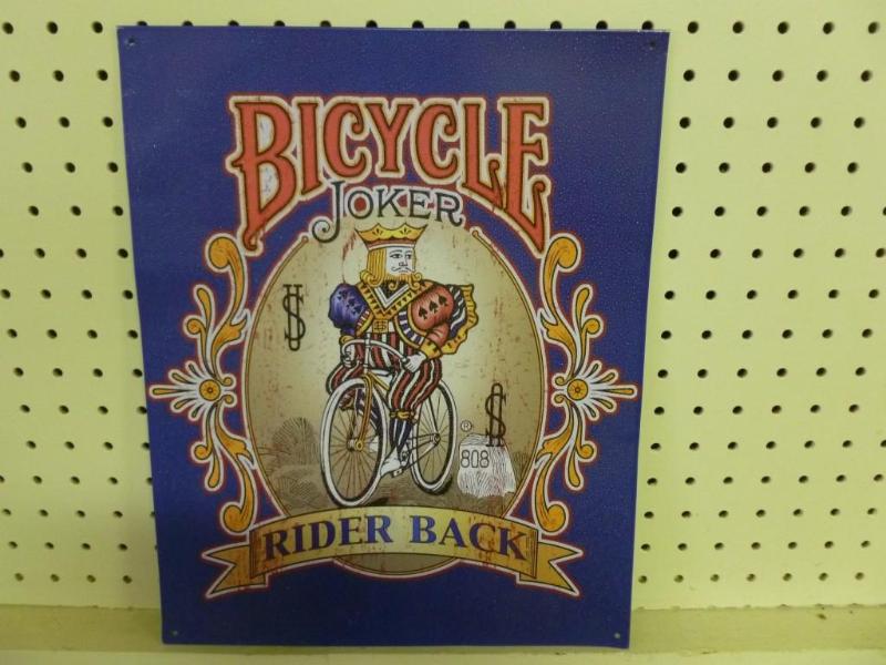 lot 57 image: Bicycle Rider Back metal sign that ...