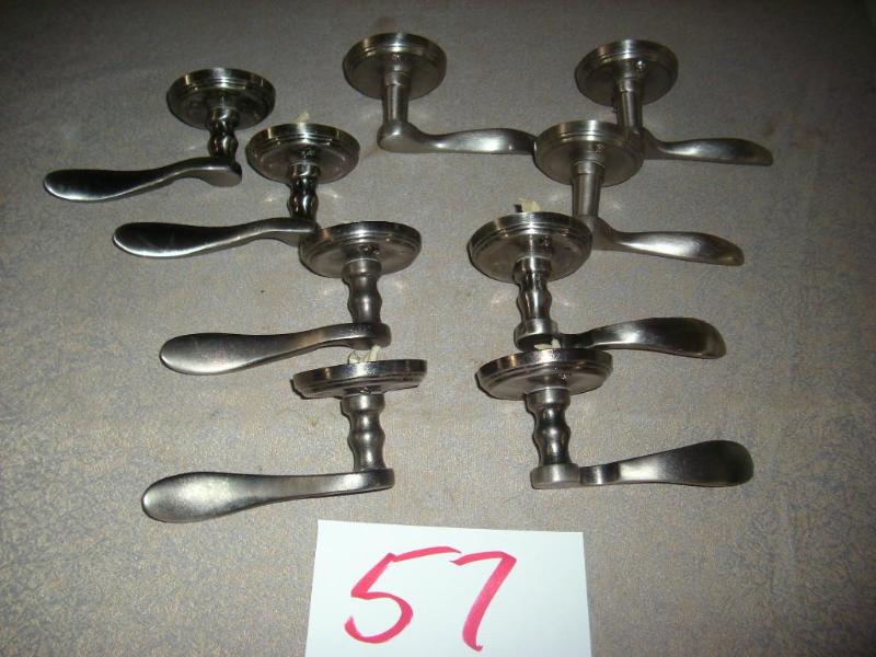 9 stainless steel door levers...