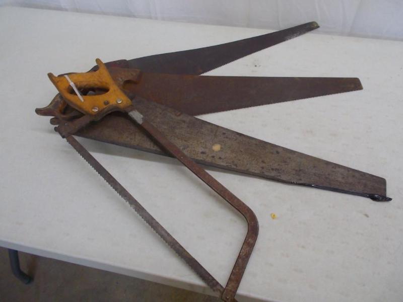 3 carpenter saws and 1 meat saw....