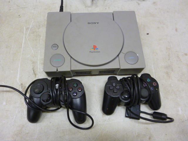 PlayStation with 2 Controllers and ...