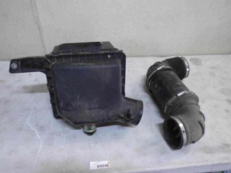 lot 10 image: Air cleaner off 06 Dodge Ram diesel...