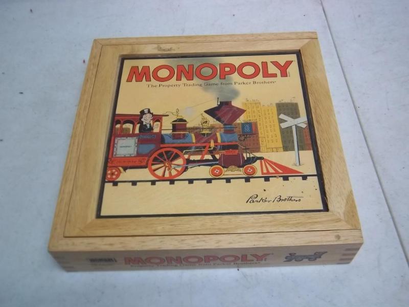 lot 139 image: Wood Monopoly Board - Looks Complet...