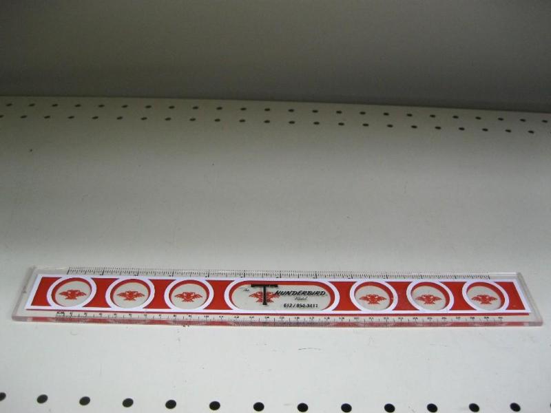 lot 142 image: Vintage Thunderbird Motel Ruler...