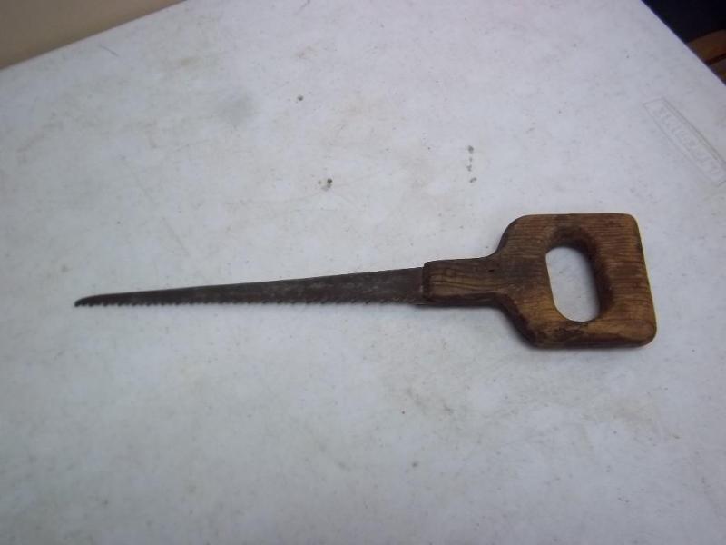 lot 21 image: Vintage Wood Handled Saw...