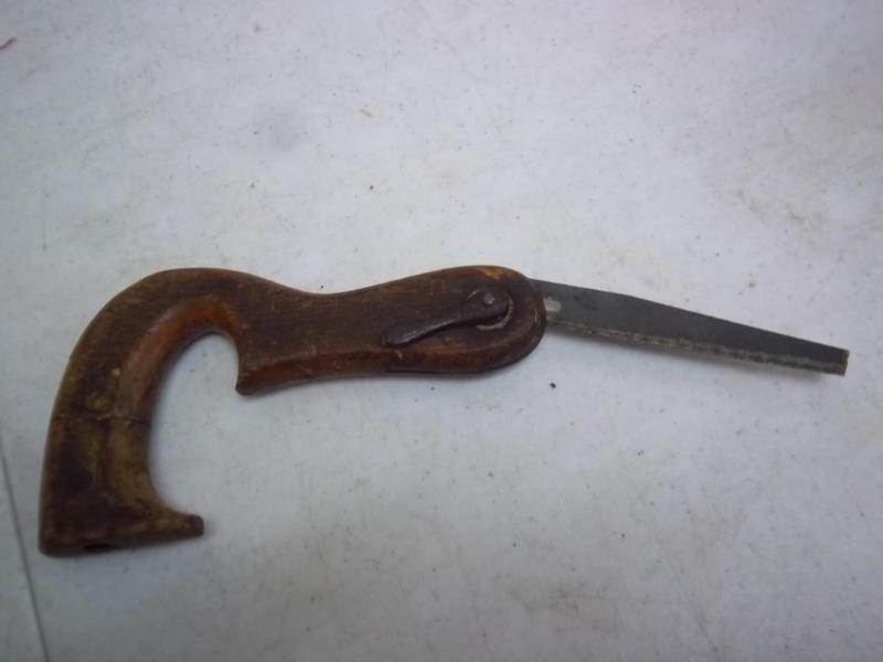 lot 6 image: Antique Fold Out Saw...