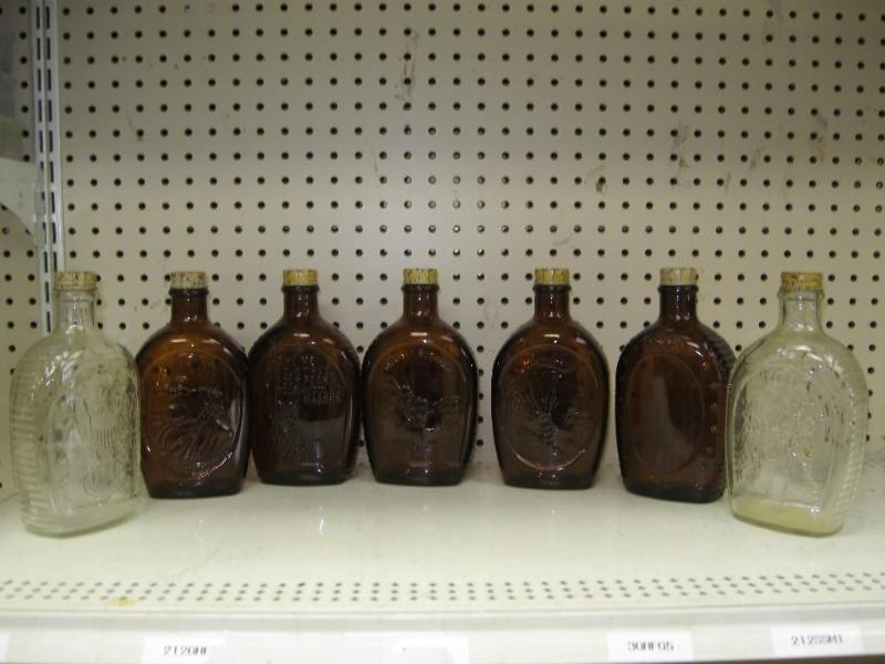 lot 88 image: Lot Of Vintage Syrup Bottles With V...