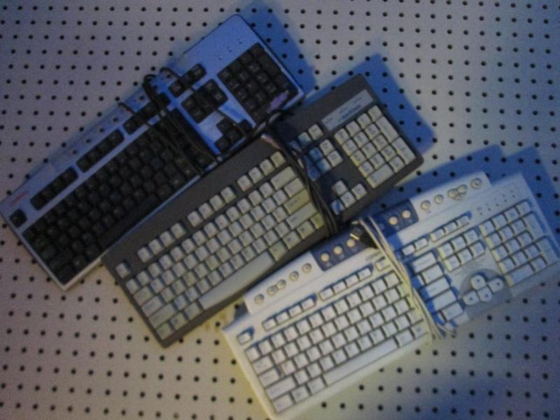 3 used keyboards, 2 are pin plug, 1...